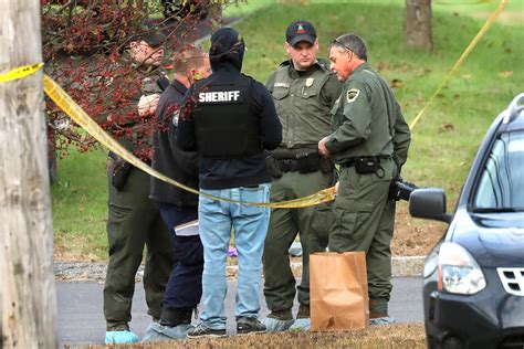 A suspect in the fatal shooting of 18 in Maine is still at large. Residents are sheltering in place